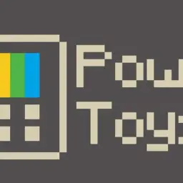 Pixelowy symbol z tęczą i przyciskami obok napisu "PowerToys".