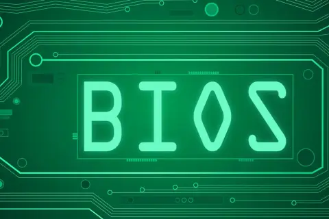 Zielone linie obwodu drukowanego tworzą tło dla neonowego napisu BIOS.