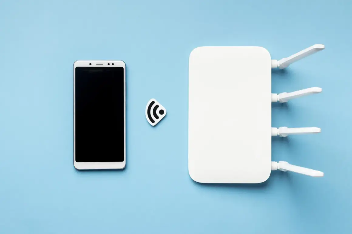 Smartfon i router Wi-Fi, symbolizujące tethering, gotowe do połączenia.