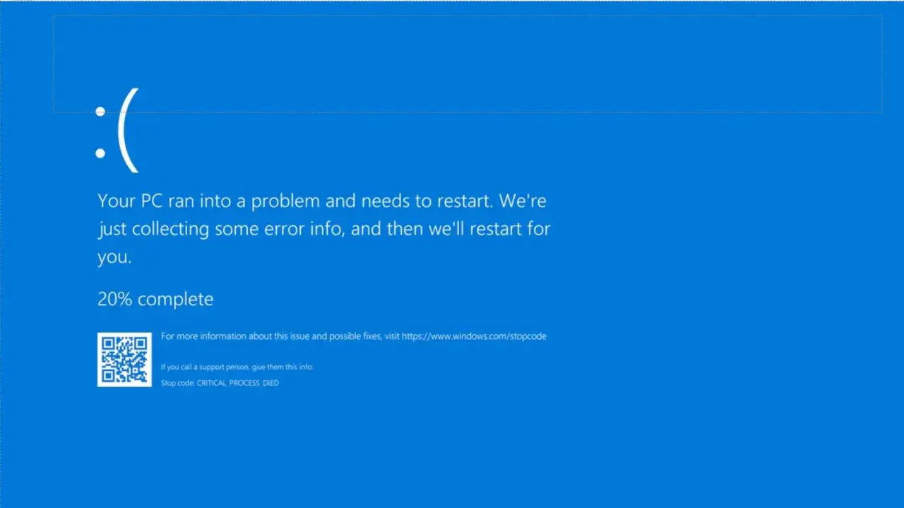 Smutna buźka na niebieskim ekranie Windows 10. Komputer napotkał problem i zbiera informacje o błędzie.